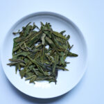 Hangzhou —  West Lake Hú Lóngjǐng Lǜ Chá | Classic Dragon Well Green Tea · Jade Clarity & Timeless Elegance